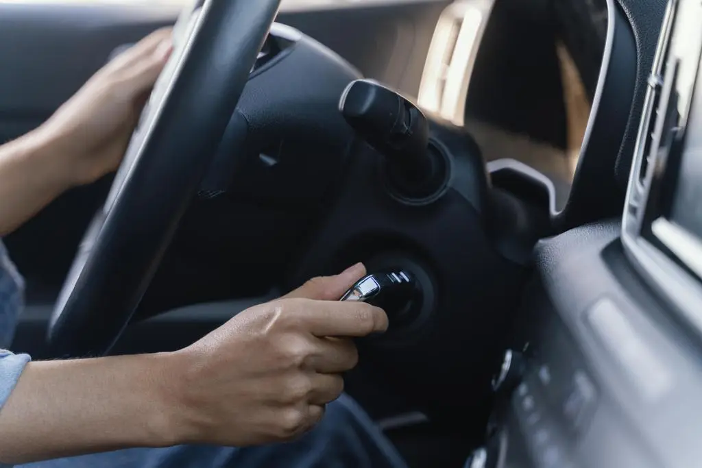 woman-starting-the-engine-of-her-car (1)