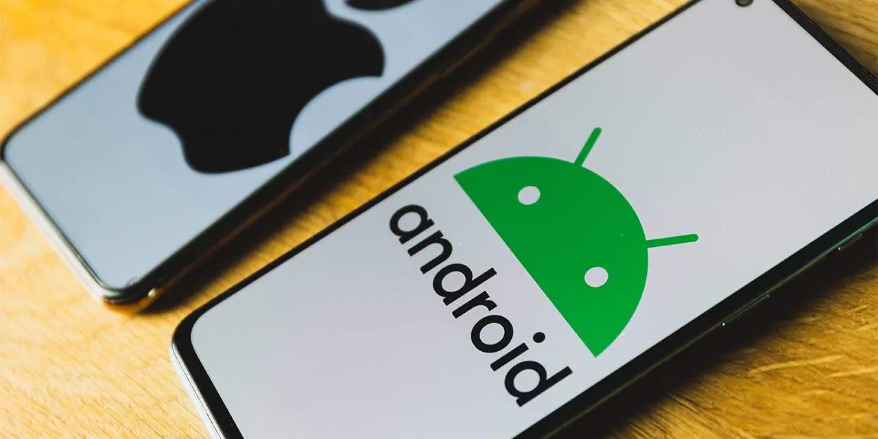 Android and Apple Iphone smartphones. Iphone IOS versus Android operating systems. High quality photo