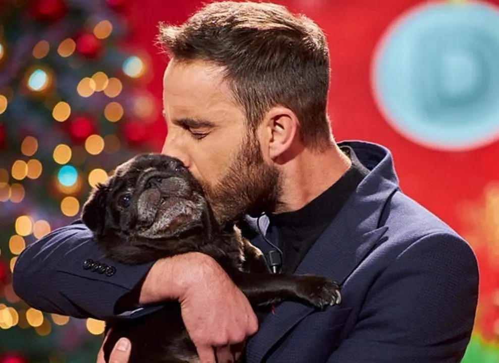 Dani Rovira junto a su carlino. Imagen de archivo