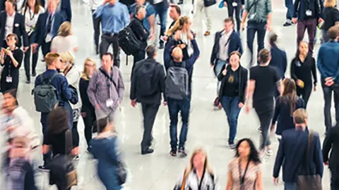 business people crowd at a tradeshow, banner size. ideal for websites and magazines layouts