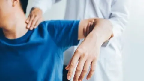 Osteópata. Fotografía de archivo