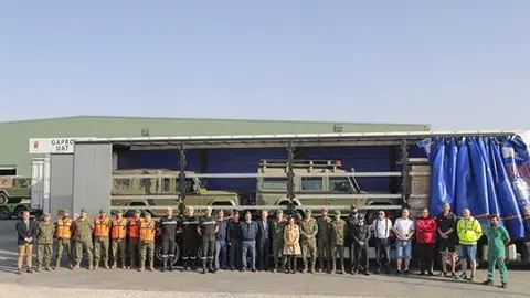 La ministra de Defensa, Margarita Robles, asiste a la salida de un grupo de vehículos logísticos en apoyo a las FAS de Ucrania, en las instalaciones del Grupo de Apoyo a la Proyección (GAPRO), en Alcalá de Henares