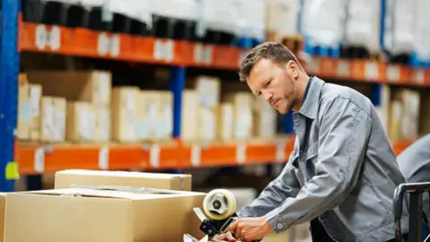 Mozo de almacén. Fotografía de archivo