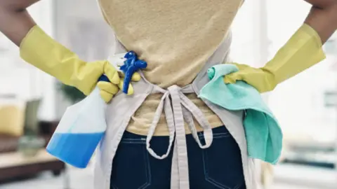 Labores del hogar. Fotografía de archivo