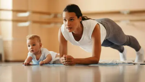 Deportista maternidad. Fotografía de archivo
