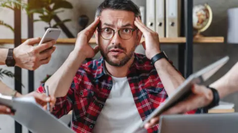 Multitasking. Fotografía de archivo