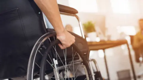 Silla de ruedas. Fotografía de archivo