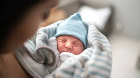 Bebé recién nacido. Fotografía de archivo