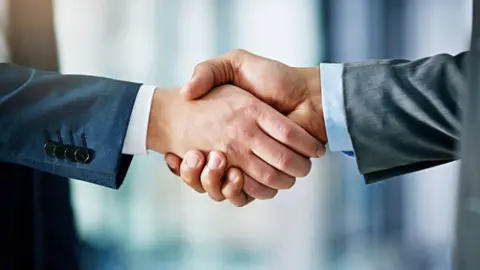 Acuerdo negocio. Fotografía de archivo