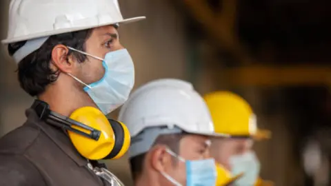 Trabajadores de la construcción durante el Covid. Fotografía de archivo