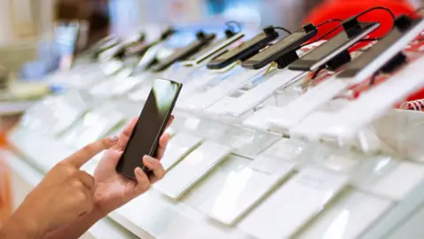 Tienda de móviles. Fotografía de archivo