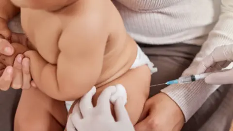 Vacuna bebé. Fotografía de archivo