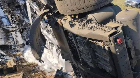 camión volcado en la A6. imagen de archivo
