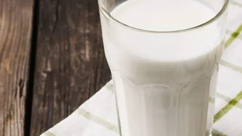 Vaso de leche Archivo