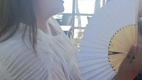 Mujer con abanico